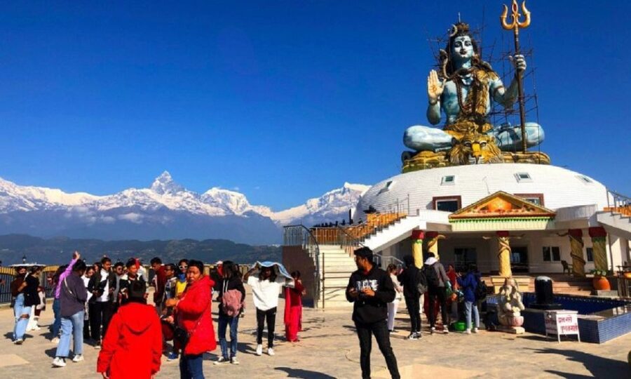 From Pokhara: Guided Day Jungle Hiking Tour with Boat Ride - Davis Falls is brief, dramatic, and often crowded