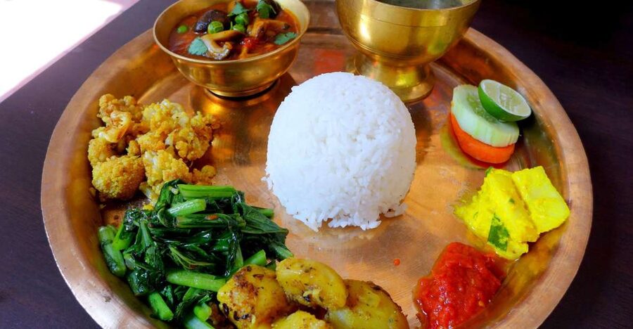 Kathmandu: Nepali Cooking Class with Hotel Pickup - Cooking momo, curry, roti, and sel roti
