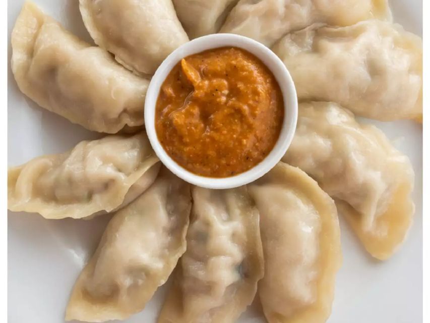 Nepalese Kitchen in Pokhara: Momos or Dal Bhat Cooking Class - Cooking Nepalese food in Sarita’s family kitchen