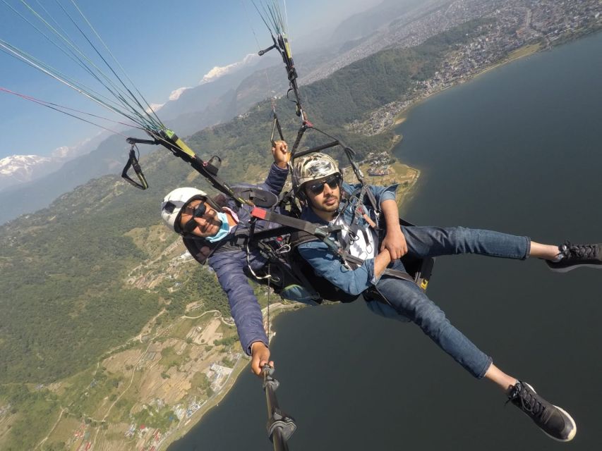 Pokhara: Adventure Paragliding Trip with Photos and Videos - Landing, return transfer, and timing
