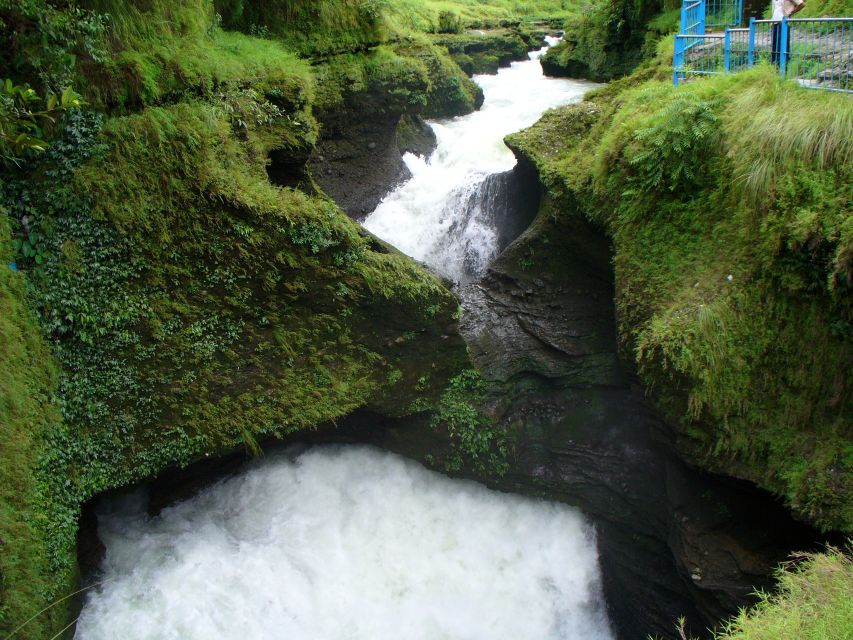 Pokhara: Full-Day Guided Sightseeing Tour - Davis Fall adds water and movement to the city tour