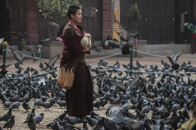 Temples and Stupas Tour in Kathmandu Valley - Boudhanath Stupa: prayer around a Buddhist landmark